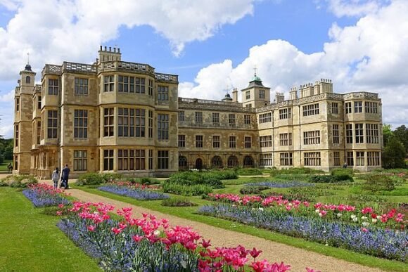 Audley End House with colourful formal flower beds and landscaped gardens in Saffron Walden, Essex