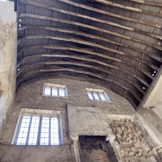 Vaulted timber roof and medieval stone walls inside Blackfriars Priory in Gloucester