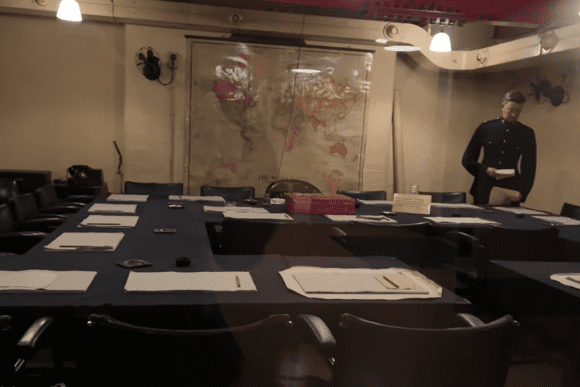 Cabinet Room inside the Churchill War Rooms with conference table, documents, and world map.