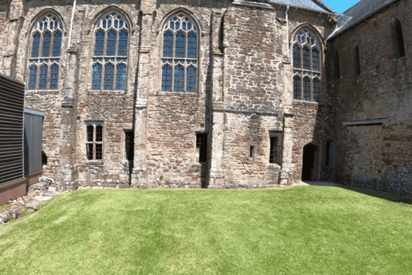 Medieval stone buildings and windows at Cleeve Abbey.