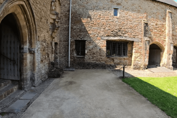 Arched doorways and stone walls at Cleeve Abbey.
