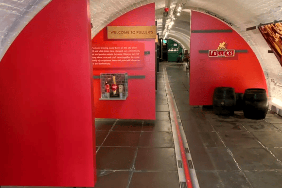 Interactive exhibition inside Fuller's Griffin Brewery in Chiswick featuring brewery history displays, Fuller's branding, and educational exhibits about traditional British brewing.