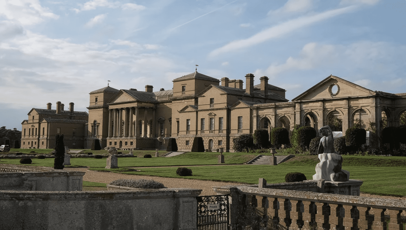 Holkham Hall, a grand Palladian country house with columns and landscaped gardens in Norfolk.