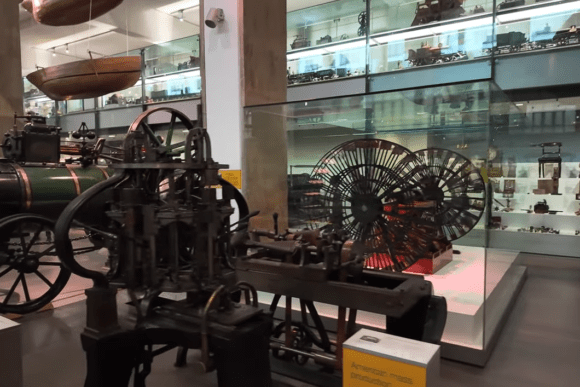Historic industrial machinery and steam-powered engineering exhibits on display inside the Science Museum in London, featuring early mechanical technology and scientific innovations.