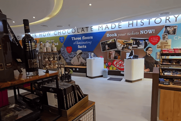 Interior gift shop and reception area at York’s Chocolate Story featuring chocolate gifts, York confectionery displays and visitor information for guided chocolate tours.