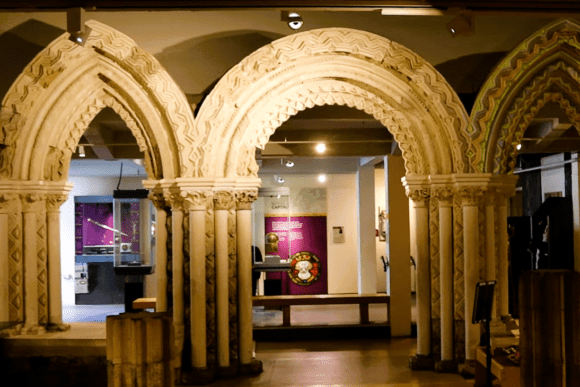 Historic Norman stone arches and carved Romanesque architectural fragments displayed inside Yorkshire Museum, showcasing medieval craftsmanship and Yorkshire’s rich ecclesiastical heritage.